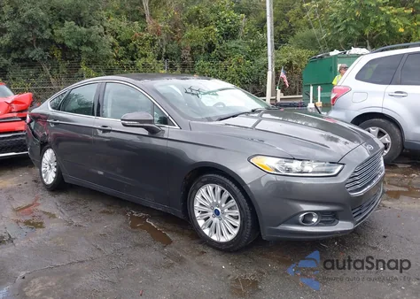 2015 Ford Fusion Energi Se Luxury z USA, uszkodzony, nr VIN 3FA6P0PUXFR168130